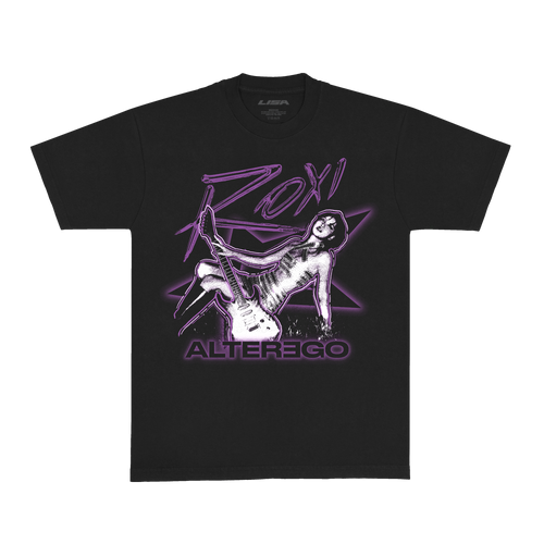Front view of a black unisex short-sleeve T-shirt showcasing bold purple “ROXY” text above a black-and-white photo of Lisa as her alter ego Roxy, framed by a purple outline. A purple star outline appears behind the image, with “Alterego” printed below in black text accented by a purple border.